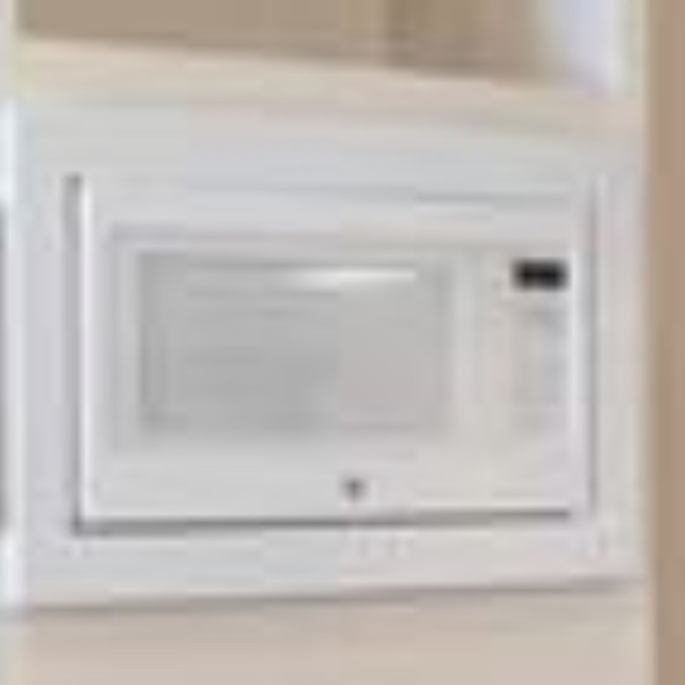 Ge Microwave  brand new was in brand new house when we bought it.